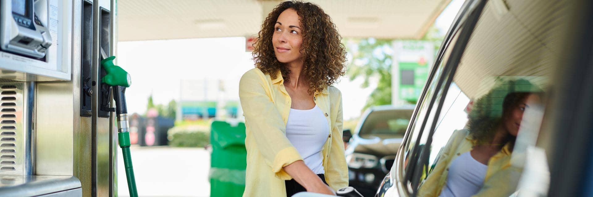 woman at petrol station