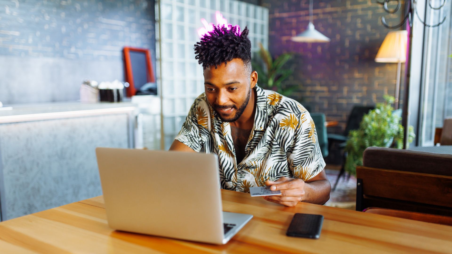 Man shopping on laptop