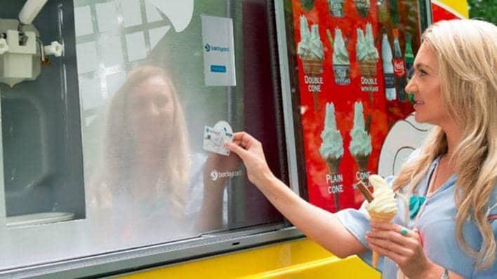 Woman using self service ice cream van