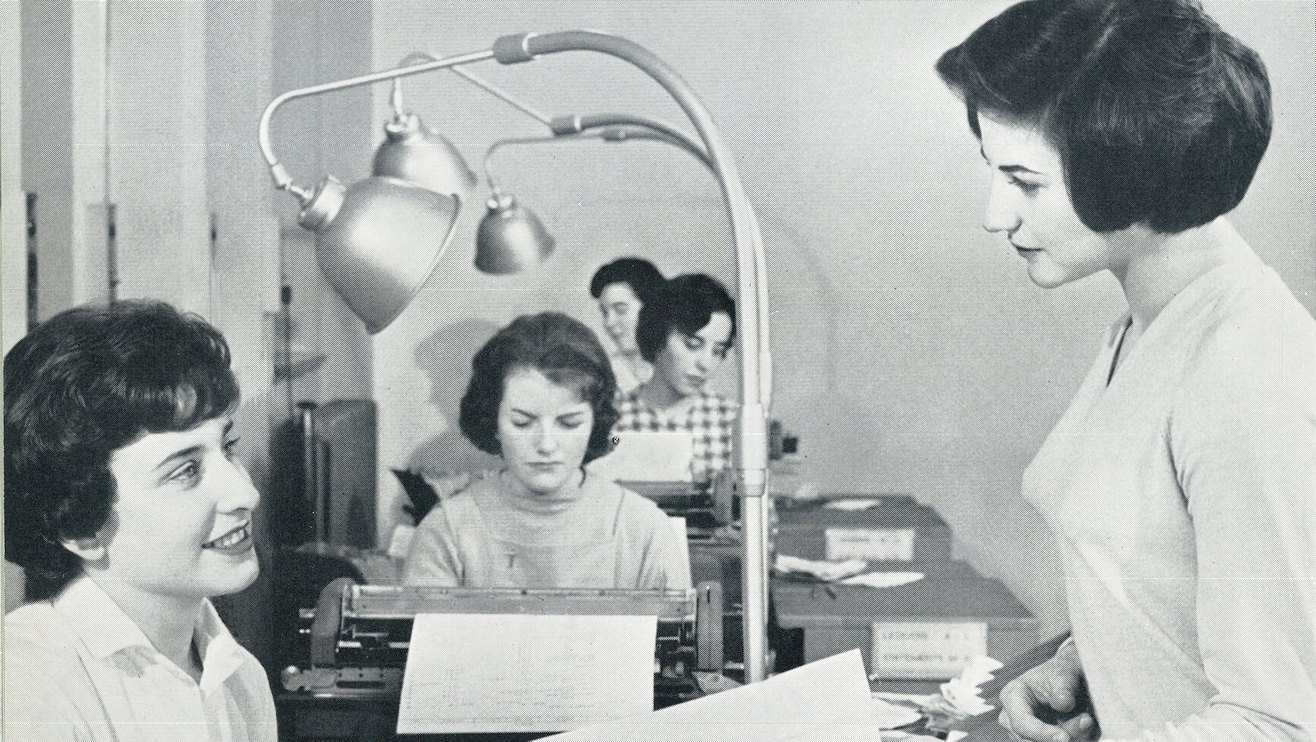 Women working at a Barclays branch