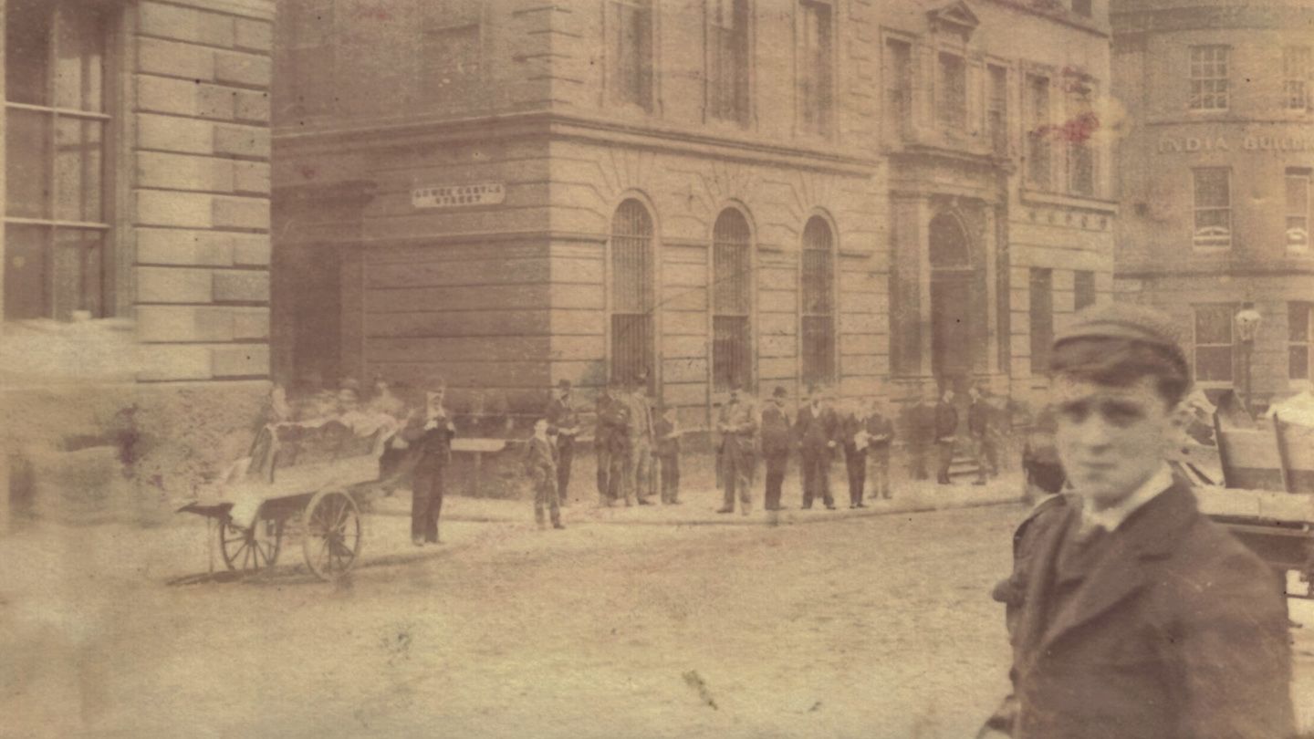 A young Barclays bank out-teller photographed on the streets of Liverpool in 1895.