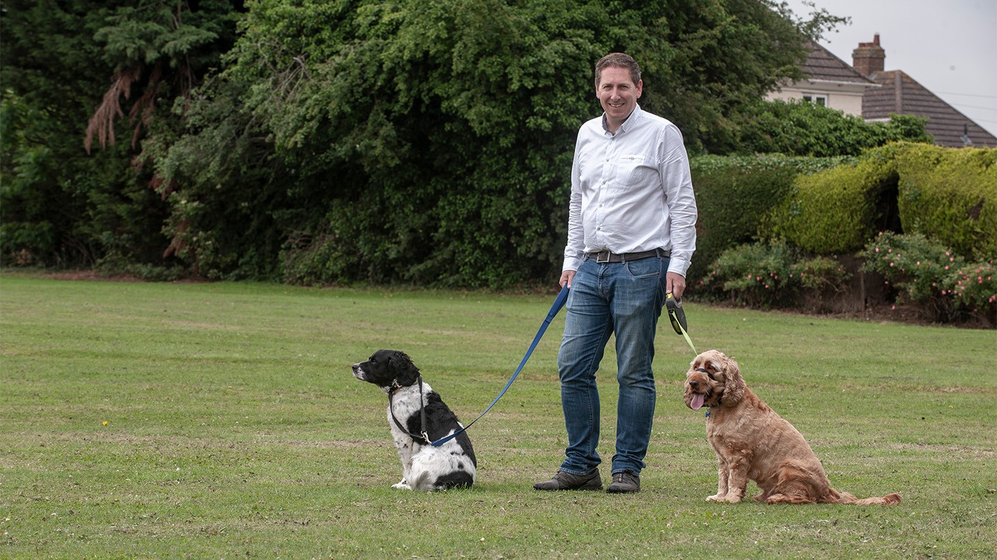 Barclays’ Jonathan Steer with his two dogs