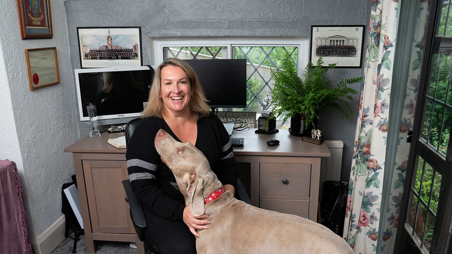 Lisa Marr at home with her dog.