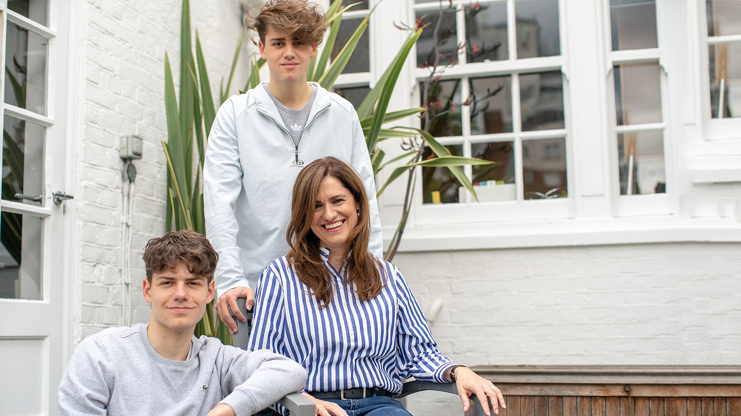 Barclays’ Esra Turk and her two sons outside their house.