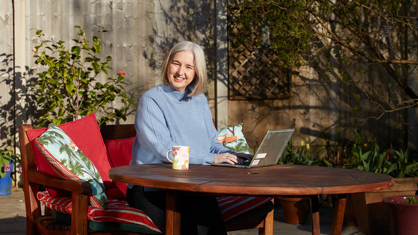 Edel Owen, Head of Applied Research and Development at Barclays, working in her garden.