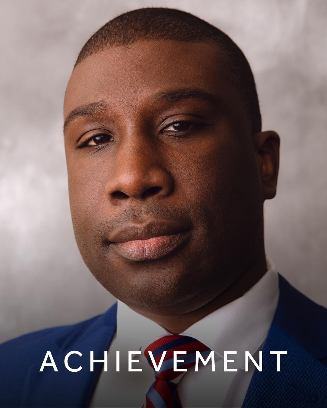 An image of Davin Barker overlaid with the word ‘achievement’.