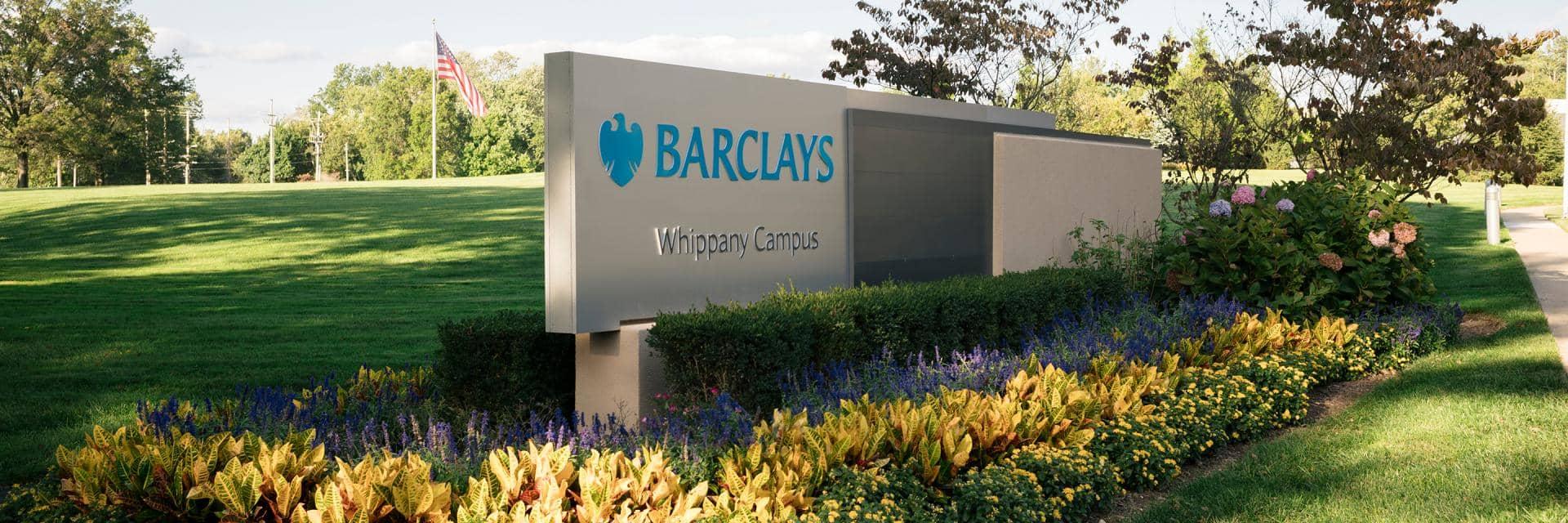 Barclays Whippany campus sign surrounded by plants