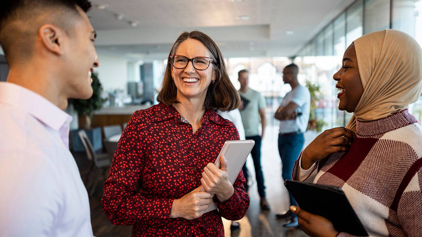 Co-workers smiling